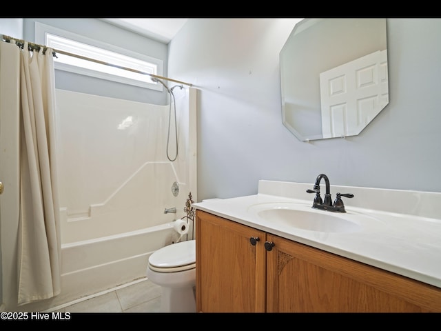 1133 Grandiflora Dr, Leland, NC 28451 - full bath with shower / bath combination with curtain, vanity, tile patterned flooring, and toilet