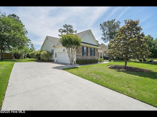 1133 Grandiflora Dr, Leland, NC 28451 - view of front facade with driveway, an attached garage, a front lawn, and brick siding