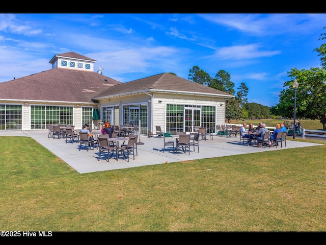 1133 Grandiflora Dr, Leland, NC 28451 - view of property's community featuring a lawn and a patio