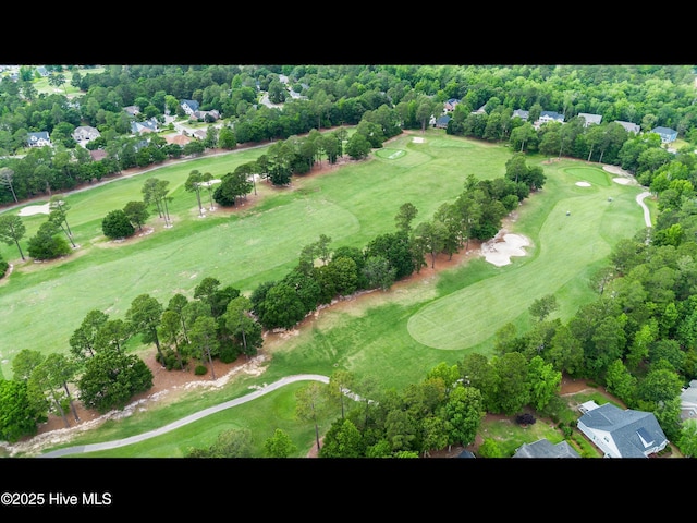 1133 Grandiflora Dr, Leland, NC 28451 - aerial view of property's location with a golf course and a tree filled landscape