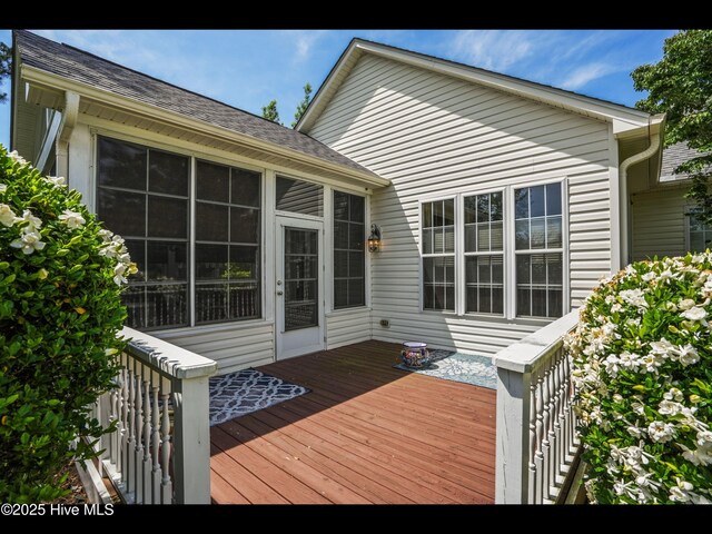 1133 Grandiflora Dr, Leland, NC 28451 - deck featuring a sunroom