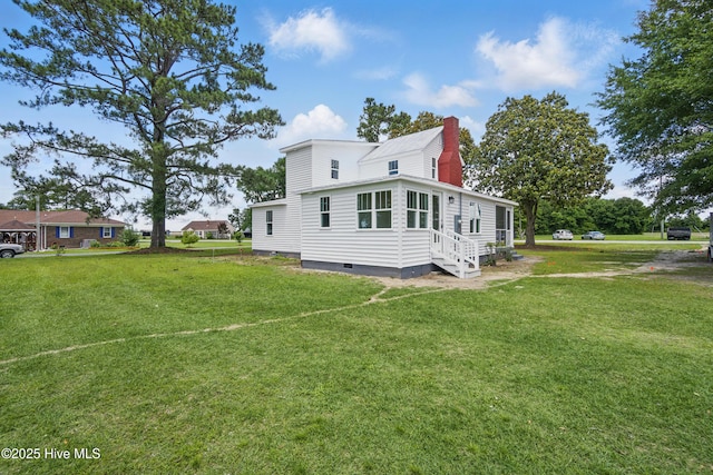 257 Evans-Bass Rd, Edenton, NC 27932 - view of side of home with crawl space, a chimney, entry steps, and a lawn