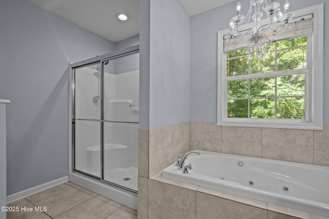 100 Hedingham Ct, Wilmington, NC 28412 - bathroom with a chandelier, a stall shower, a whirlpool tub, and plenty of natural light