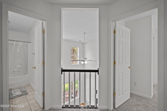 100 Hedingham Ct, Wilmington, NC 28412 - hallway with a textured ceiling and baseboards