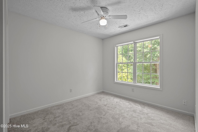 100 Hedingham Ct, Wilmington, NC 28412 - carpeted empty room featuring baseboards, a textured ceiling, and a ceiling fan