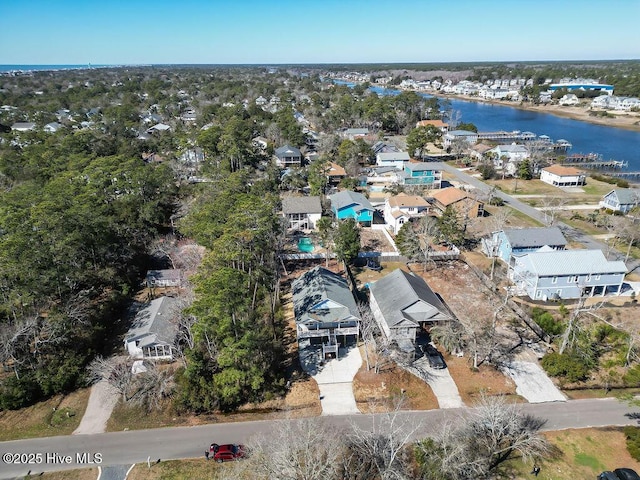335 NE 41st St, Oak Island, NC 28465 - aerial view of property's location with nearby suburban area and a large body of water