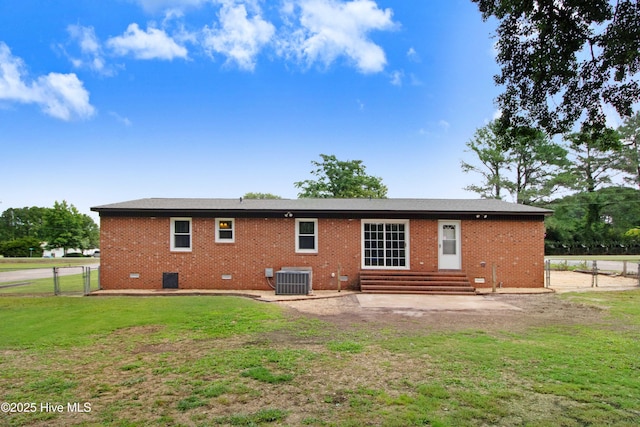 287 Perkins Rd, Goldsboro, NC 27530 - back of house with entry steps, brick siding, cooling unit, and a gate