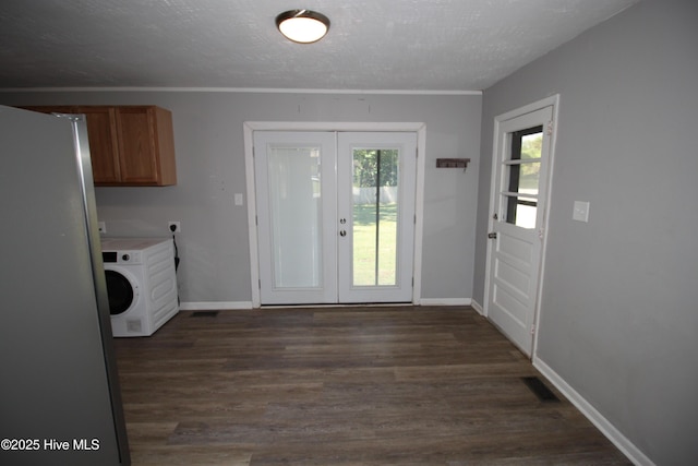 114 Pinecone Ln, Havelock, NC 28532 - laundry room featuring french doors, cabinet space, dark wood finished floors, washer / clothes dryer, and baseboards