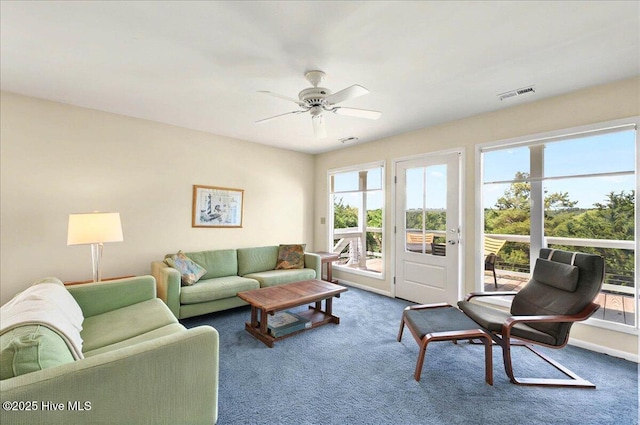 256 Brunswick Ave W Unit A, Holden Beach, NC 28462 - carpeted living room featuring plenty of natural light and ceiling fan