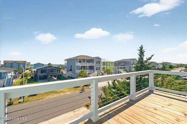 256 Brunswick Ave W Unit A, Holden Beach, NC 28462 - wooden terrace featuring a residential view