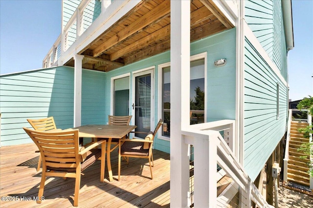 256 Brunswick Ave W Unit A, Holden Beach, NC 28462 - deck featuring outdoor dining area