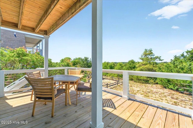 256 Brunswick Ave W Unit A, Holden Beach, NC 28462 - deck featuring outdoor dining area