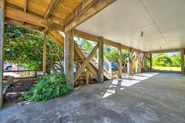 256 Brunswick Ave W Unit A, Holden Beach, NC 28462 - view of patio with stairway and a carport
