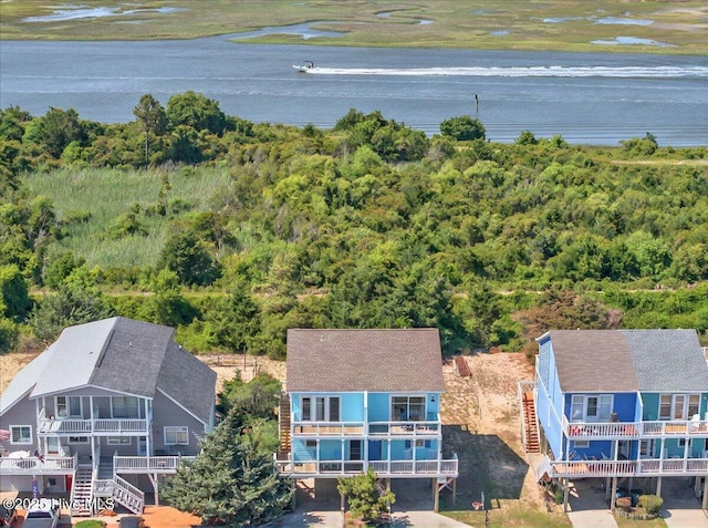 256 Brunswick Ave W Unit A, Holden Beach, NC 28462 - view of subject property with a heavily wooded area