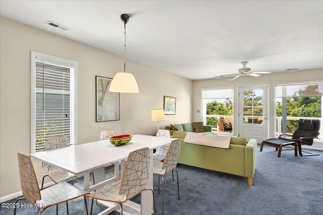 256 Brunswick Ave W Unit A, Holden Beach, NC 28462 - dining space featuring carpet floors and ceiling fan