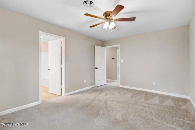 103 Sawgrass Pl, Goldsboro, NC 27534 - carpeted spare room featuring a ceiling fan and baseboards