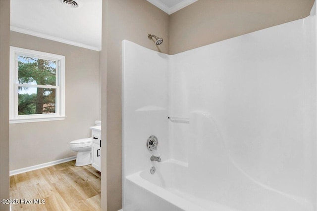 103 Sawgrass Pl, Goldsboro, NC 27534 - bathroom featuring tub / shower combination, ornamental molding, wood finished floors, and vanity