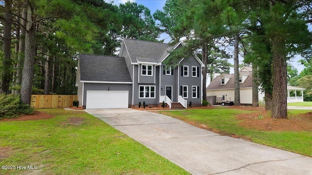 103 Sawgrass Pl, Goldsboro, NC 27534 - colonial-style house featuring concrete driveway, a garage, and roof with shingles