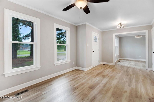 103 Sawgrass Pl, Goldsboro, NC 27534 - empty room featuring light wood finished floors, ceiling fan, and ornamental molding