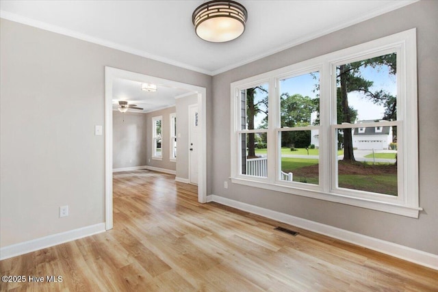 103 Sawgrass Pl, Goldsboro, NC 27534 - spare room with light wood finished floors, ornamental molding, and ceiling fan
