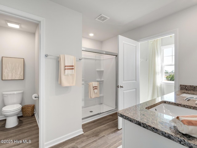159 Legare St Lot 250, Wilmington, NC 28411 - bathroom featuring wood finished floors, a stall shower, vanity, toilet, and recessed lighting
