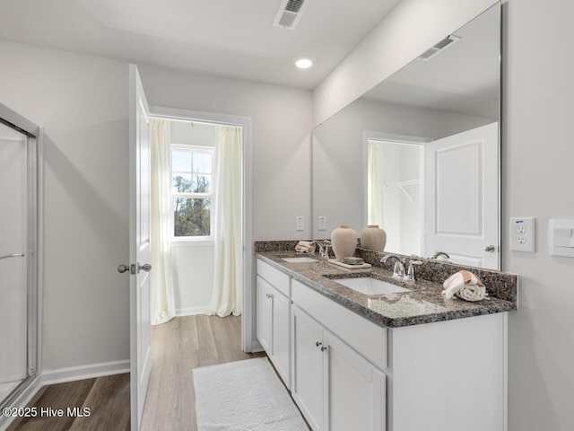 159 Legare St Lot 250, Wilmington, NC 28411 - full bathroom featuring wood finished floors, double vanity, recessed lighting, and baseboards