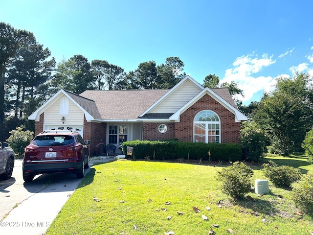 5707 Mossberg Ct, Wilmington, NC 28405 - single story home with brick siding, a front yard, a garage, concrete driveway, and roof with shingles