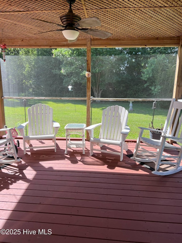 5707 Mossberg Ct, Wilmington, NC 28405 - wooden deck with a ceiling fan and a lawn