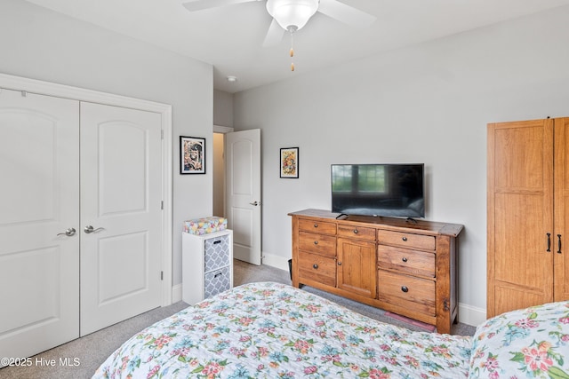3059 Irwin Dr SE, Southport, NC 28461 - bedroom with light carpet, a closet, baseboards, and ceiling fan