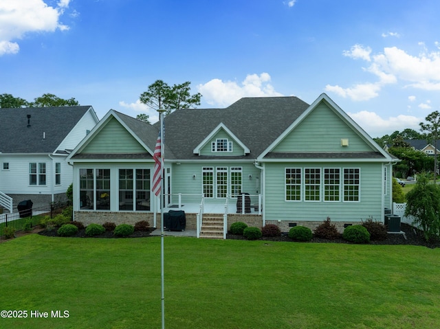 3059 Irwin Dr SE, Southport, NC 28461 - rear view of house with crawl space, central air condition unit, and a shingled roof