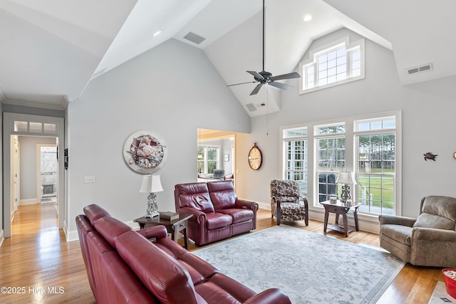 3059 Irwin Dr SE, Southport, NC 28461 - living area featuring a ceiling fan, high vaulted ceiling, light wood-type flooring, baseboards, and recessed lighting