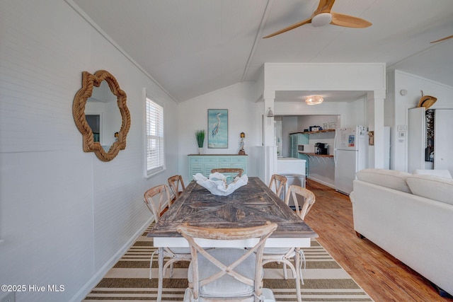 1904 Ocean Blvd, Topsail Beach, NC 28445 - dining area with lofted ceiling, wood finished floors, and ceiling fan