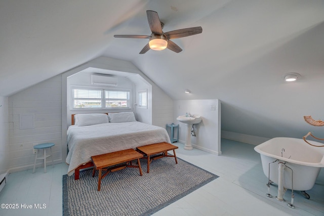 1904 Ocean Blvd, Topsail Beach, NC 28445 - bedroom featuring a wall mounted AC, vaulted ceiling, and a ceiling fan