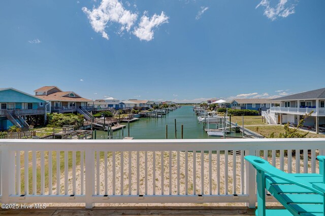 1904 Ocean Blvd, Topsail Beach, NC 28445 - water view featuring a dock and nearby suburban area