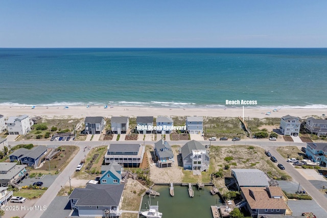 1904 Ocean Blvd, Topsail Beach, NC 28445 - aerial overview of property's location with extended coastline and nearby suburban area
