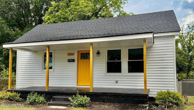 1200 N Center St, Goldsboro, NC 27530 - bungalow-style home with a porch and roof with shingles