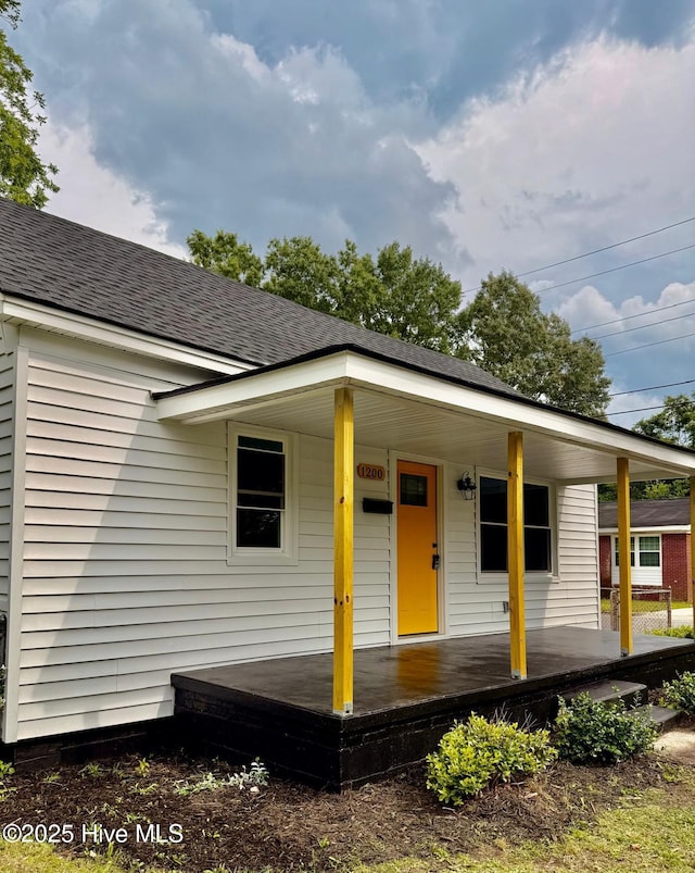 1200 N Center St, Goldsboro, NC 27530 - bungalow-style home featuring covered porch and a shingled roof