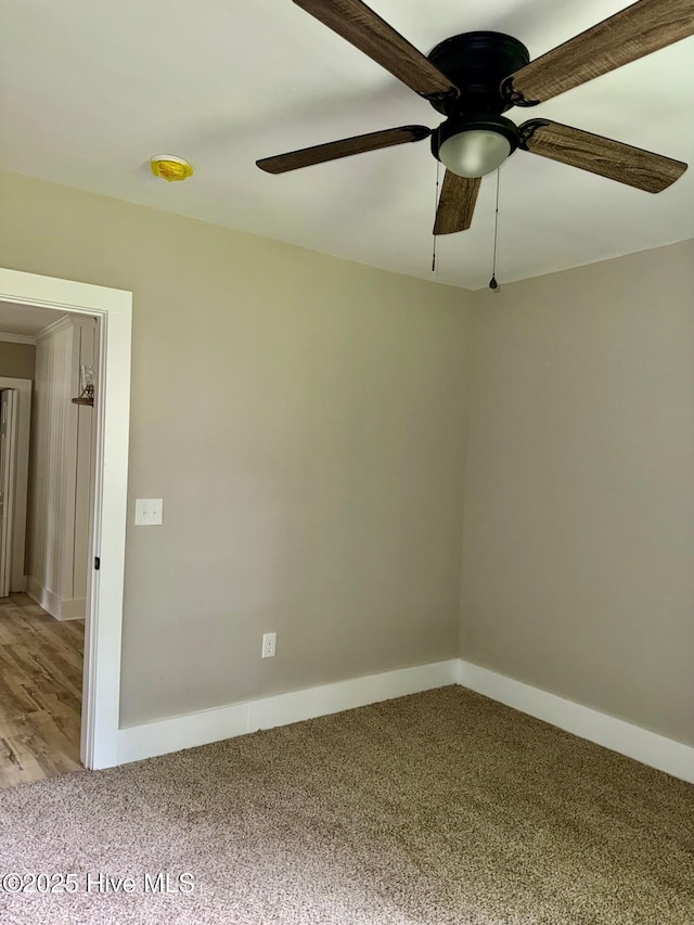 1200 N Center St, Goldsboro, NC 27530 - unfurnished room with a ceiling fan, light carpet, a smoke detector, and baseboards