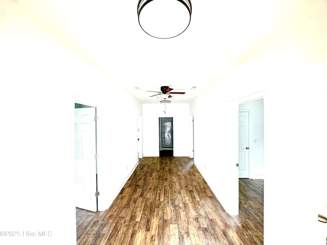 216 S Tillery St, Rocky Mount, NC 27804 - hall with dark wood-type flooring and baseboards