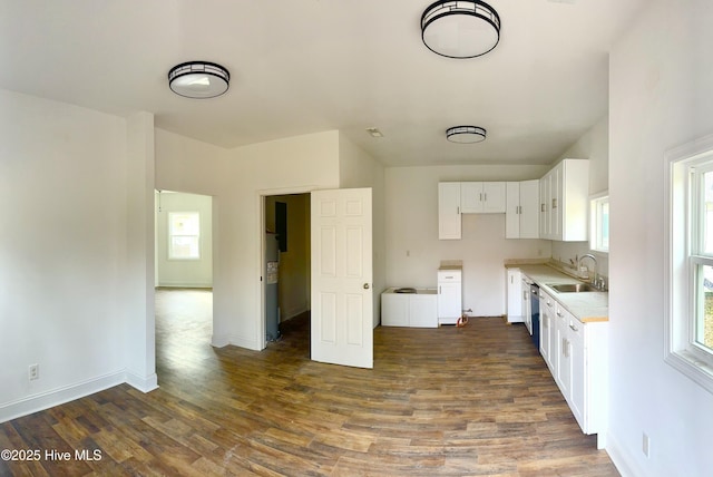 216 S Tillery St, Rocky Mount, NC 27804 - kitchen featuring a sink, dark wood-style flooring, and white cabinets