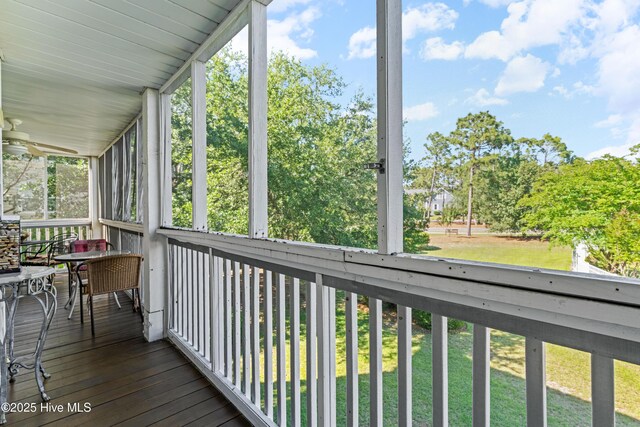 3350 Club Villas Dr # 1403, Southport, NC 28461 - unfurnished sunroom with a ceiling fan