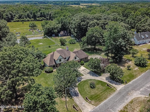 102 Plantation Rd, Goldsboro, NC 27530 - aerial view of property and surrounding area featuring a forest