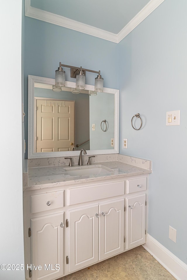 102 Plantation Rd, Goldsboro, NC 27530 - bathroom with ornamental molding, vanity, and baseboards