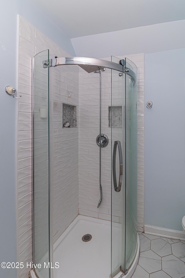 102 Plantation Rd, Goldsboro, NC 27530 - bathroom featuring a shower stall, tile patterned floors, and toilet
