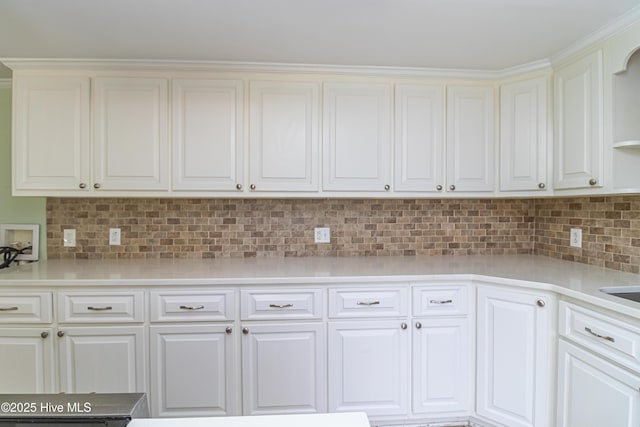 102 Plantation Rd, Goldsboro, NC 27530 - kitchen with light countertops, white cabinets, decorative backsplash, and open shelves