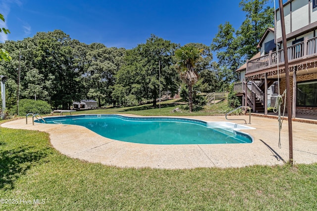 102 Plantation Rd, Goldsboro, NC 27530 - outdoor pool featuring stairs, a wooden deck, a lawn, a patio, and a diving board