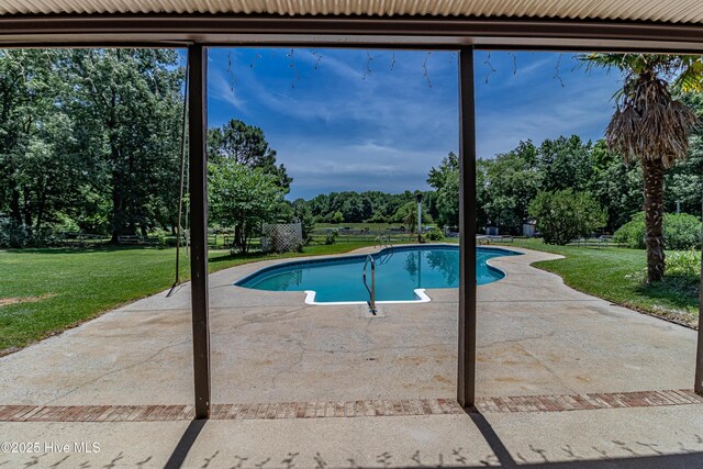102 Plantation Rd, Goldsboro, NC 27530 - outdoor pool featuring a patio, a lawn, and view of scattered trees