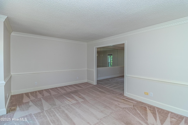 102 Plantation Rd, Goldsboro, NC 27530 - carpeted spare room featuring ornamental molding, a textured ceiling, and baseboards