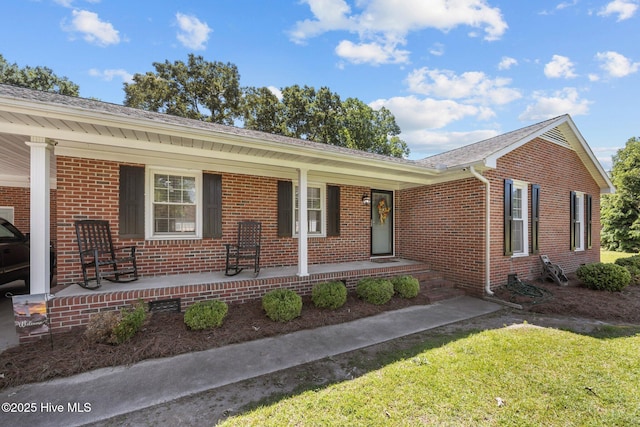 5137 Carr, Grifton, NC 28530 - ranch-style home with a porch, brick siding, and a front yard