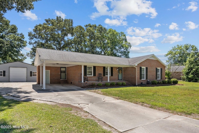 5137 Carr, Grifton, NC 28530 - ranch-style home featuring driveway, brick siding, an outdoor structure, and a front yard